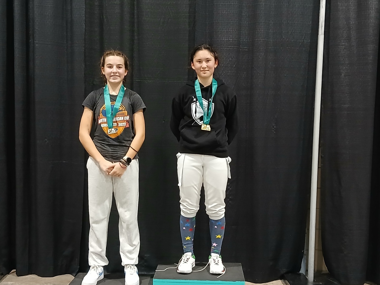 EG Burt wearing her medal after winning Cadet Women's Épée at the River City Regional Rumble RYC